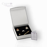 Jewelry set with tiaras and a scepter in a 'Crowns & Regalia' box on a white background